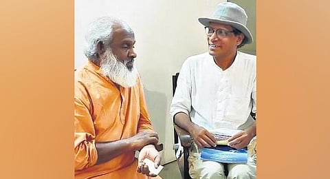 Suresh Nair (right) with Swami Krishnananda Bharathi. (Photo | Express)