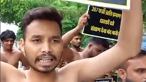 A group of men without clothes staged a protest in Raipur on Tuesday demanding action against people who allegedly got government jobs using fake caste certificates. (Video grab)