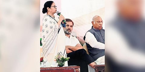 West Bengal CM Mamata Banerjee makes a point at the meeting. Former Congress MP Rahul Gandhi and AICC chief Mallikarjun Kharge look on | Nagaraja Gadekal