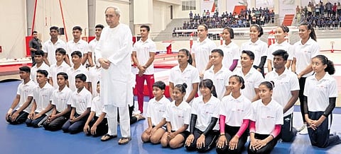 Chief Minister Naveen Patnaik posing with young gymnasts | EXPRESS
