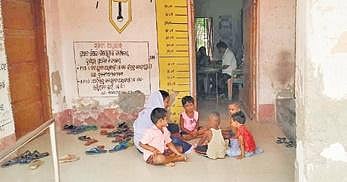 Students at the dilapidated school building in Erasama | Express