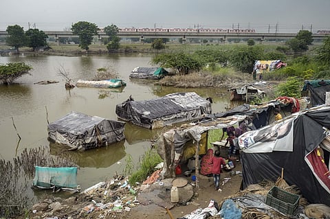 Houses submerged in the floodwaters of Yamuna river near Nizamuddin Bridge, in New Delhi, Tuesday, July 18, 2023. (Photo|PTI)