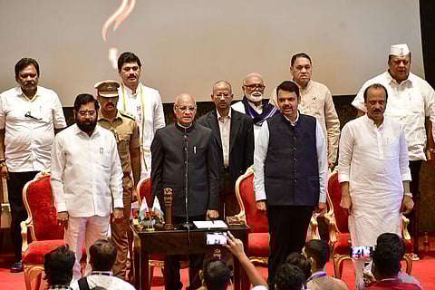 Maharashtra Governor Ramesh Bais with Chief Minister Eknath Shinde, Deputy Chief Ministers Devendra Fadnavis and Ajit Pawar, and newly sworn-in State Cabinet ministers during a ceremony. | PTI