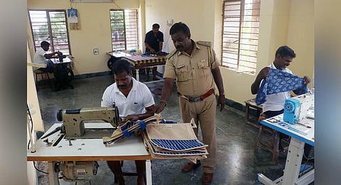 Prisoners making shopping bags at Puducherry central prison. They are also trained in Warli art, marbling art and fabric printing. (Photo | Sriram R, EPS)