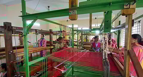 Trainees learning to weave Udupi sarees at the district resource centre Manipal. (Photo | Express)