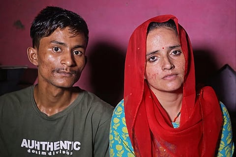 Sachin Meena and Seema Haider at their home in Rabupura village. (AFP)