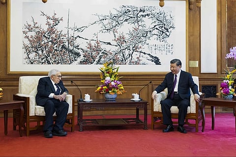 In this photo released by Xinhua News Agency, Chinese President Xi Jinping, right, talks to former US Secretary of State Henry Kissinger, July 20, 2023. (Photo | AP)