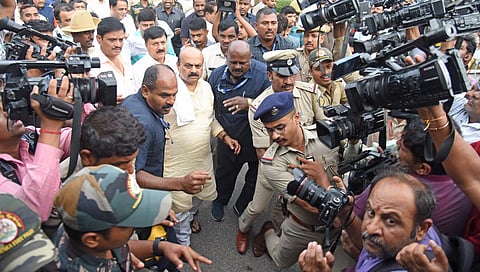 Ex-CM Basavaraj Bommai being detained for protesting outside Vidhana Soudha in Bengaluru. (Photo | Vinod Kumar T, EPS)