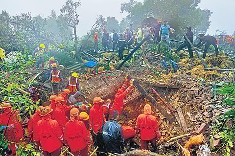 Rescuers work at the landslide site in Raigad district, Maharashtra on Thursday | ap