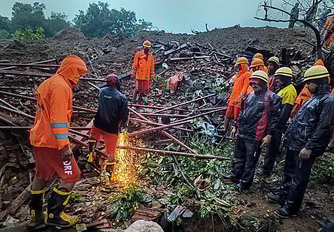 NDRF personnel during a search and rescue operation after a landslide at Irshalwadi village in Raigad district (Photo | PTI)