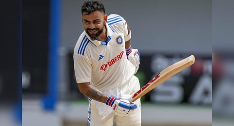 India's Virat Kohli celebrates after his century against West Indies on day two of tge second Test match at Queen's Park in Port of Spain, Trinidad and Tobago, Friday, July 21, 2023. (Photo | AP)