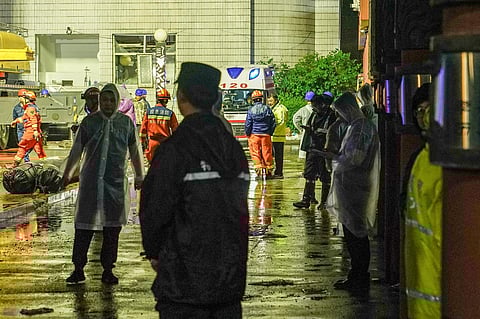Rescuers work at a school gym after the roof of the building collapsed in Qiqihar, in China's northeastern Heilongjiang province early on July 24, 2023. (AFP)