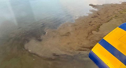 This photo provided by North Slope Borough shows an aerial view of a shallow lake where a helicopter crashed on Alaska's North Slope near Utqiagvik, Alaska, Thursday, July 20, 2023. (AP)
