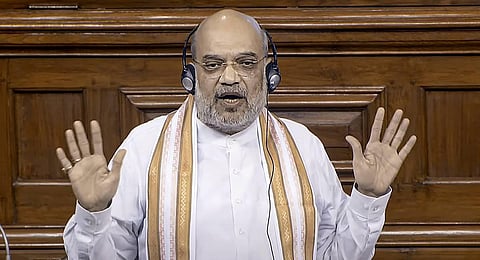 Union Home Minister Amit Shah spekas amid protest by Opposition MPs in the Lok Sabha during the Monsoon session of Parliament. (Photo | PTI)