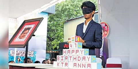 Affan Kutty creates a KTR portrait with Rubik’s cubes during celebrations held at the Thrill City on Necklace Road in Hyderabad on Monday | Sri Loganathan Velmurugan