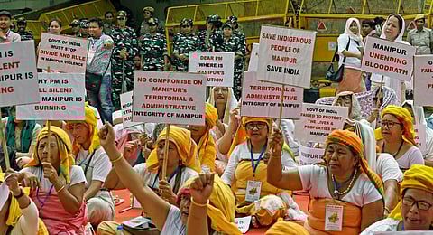People from Manipur, stage a protest over the ongoing violence in the state, at Jantar Mantar in New Delhi.(File Photo | ANI)