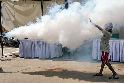 Fumigation at a makeshift camp for people affected by the floods, near the Old Yamuna Bridge (Loha Pul), in New Delhi, Monday, July 24, 2023. (Photo | PTI)