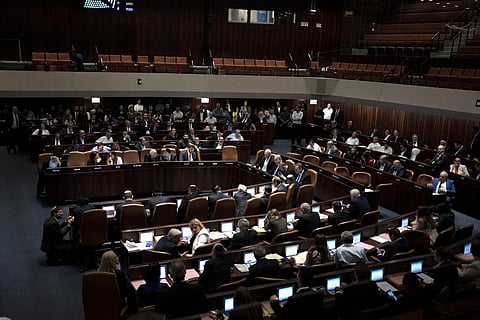Israel's Prime Minister Benjamin Netanyahu and lawmakers attend a session of the Knesset, Israel's parliament, in Jerusalem, Monday, July 24, 2023. (Photo | AP)