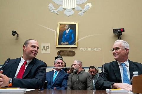 U.S. Air Force (Ret.) Maj. David Grusch, left, and U.S. Navy (Ret.) Cmdr. David Fravor, speak prior to a House Oversight and Accountability subcommittee hearing on UFOs. (Photo | AP)