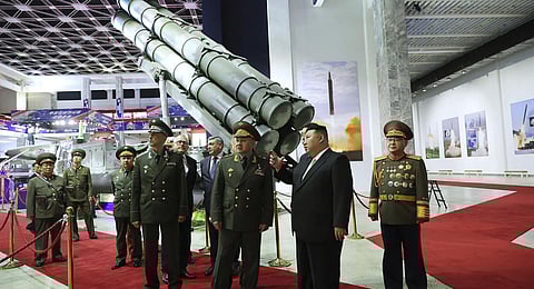 North Korean leader Kim Jong Un, second right, and Russian Defense Minister Sergei Shoigu, third right, visit an arms exhibition in Pyongyang, North Korea. (Photo | AP)