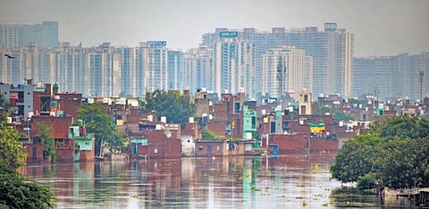 A waterlogged locality in Ghaziabad near Delhi-Meerut Expressway after the Hindon flooded the area on Wednesday. (Photo | PTI)