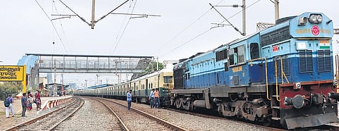 A suburban train being pulled with the help of a diesel engine from Ennore Station after a technical snag on Wednesday | Express