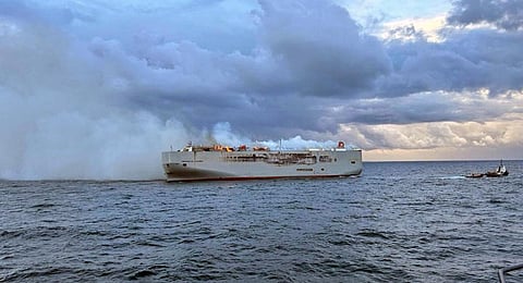 Smoke and flames are seen on a freight ship in the North Sea, about 27 kilometers (17 miles) north of the Dutch island of Ameland. (Photo | AP)
