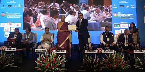 FICCI President Mr Subhrakant Panda welcomes Hon'ble Finance Minister Smt Nirmala Sitharaman with a Green Certificate during the 3rd edition of the summit on GCPMH 2023 in India. (Photo | Twitter)