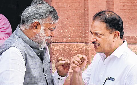 Union minister Pralhad Singh Patel and BJP MP Rajiv Pratap Rudy at Parliament House amid the monsoon session in New Delhi on Thursday | PTI