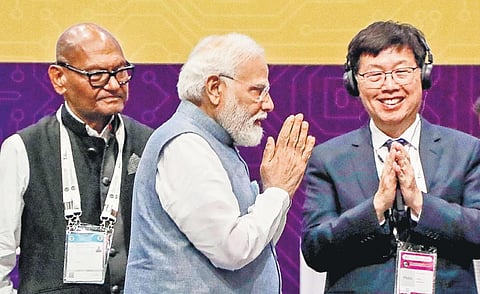 PM Modi with Foxconn chairman Young Liu and Vedanta chief Anil Agarwal on Friday. (Photo | PTI)