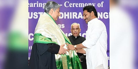 Chief Minister YS Jagan Mohan Reddy felicitates Chief Justice of High Court Dhiraj Singh Thakur after the swearing-in ceremony in Vijayawada on Friday | Express
