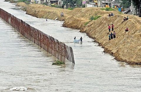The retaining wall under construction parallel to Krishna Lanka I Prasant Madugula