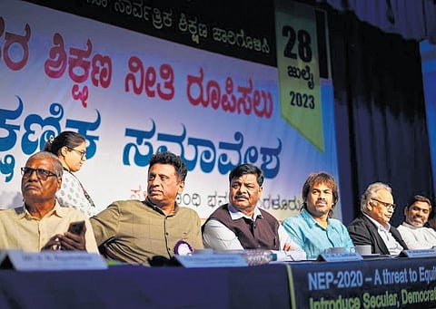 Higher Education Minister MC Sudhakar (second from left) Primary and Secondary Education Minister Madhu Bangarappa (fourth) and experts at the education conference in Bengaluru on Friday | Express
