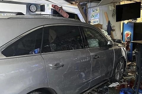 In this photo released by the Laconia Fire Department, a vehicle sits inside a restaurant after crashing through the wall on July 2, 2023. (Photo | AP)