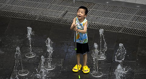 An orange alert, the second-highest level of warning, was issued for China's capital on Saturday as temperatures once again soared to around 40 degrees Celsius ina weeks-long heat wave. (Photo | AP)