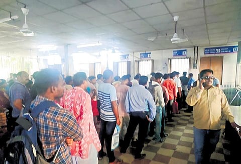 Patients and their attendants in queue at the OPD ticket counter | Express