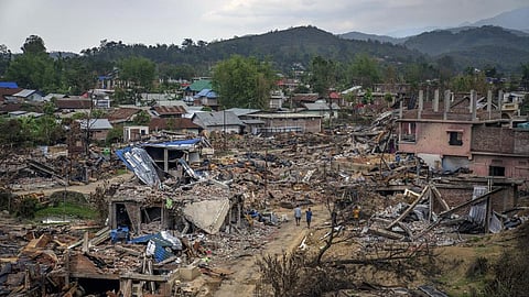 Dozens of houses lay vandalised and burnt during ethnic clashes and rioting in Sugnu, Manipur, on Wednesday, June 21, 2023.