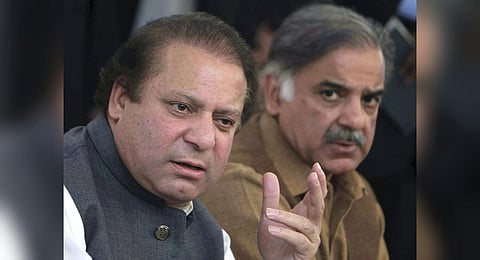 FILE - Former Pakistan PM Nawaz Sharif (L) with his brother and current premier Shahbaz Sharif during a press conference in Lahore, July 29, 2017. (Photo | PTI)