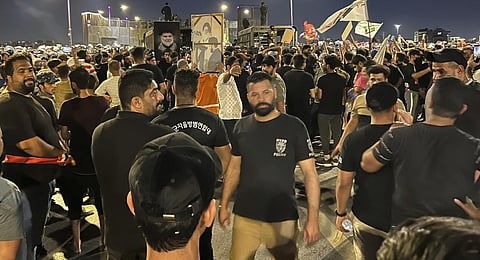 Protesters gather in Baghdad's Tahrir Square, following reports of the burning of a Quran carried out by a ultranationalist group in front of the Iraqi Embassy in Copenhagen.(Photo | AP)
