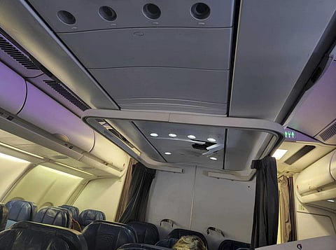 This photo provided by Tara Goodall shows a crack in the ceiling of a Hawaiian Airlines plane that encountered severe turbulence during a flight from Honolulu to Sydney, June 30, 2023. (Photo |AP)