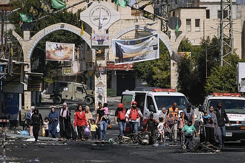 Residents of the Jenin refugee camp fled their homes as the Israeli military pressed ahead with an operation in the area, in Jenin, West Bank, Tuesday, July 4, 2023. (Photo | AP)