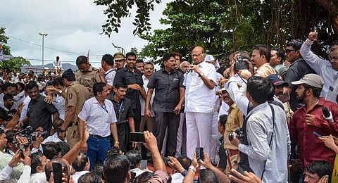 NCP Chief Sharad Pawar addresses supporters after paying tribute to former Maharashtra chief minister Yashwantrao Chavan, in Karad, Monday, July 3, 2023. (PTI)