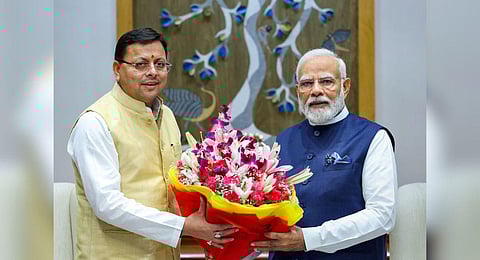 Uttarakhand Chief Minister Pushkar Singh Dhami calls on Prime Minister Narendra Modi, in New Delhi on Tuesday. (Photo | ANI)