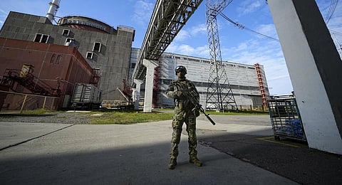 A Russian serviceman guards an area of the Zaporizhzhia Nuclear Power Station in territory under Russian military control. (File Photo | AP)