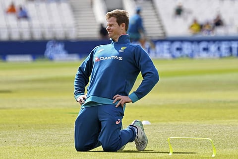 Australia's Steven Smith stretches to warm up ahead of the first day of the third Ashes Test match between England and Australia at Headingley. (Photo |AP)
