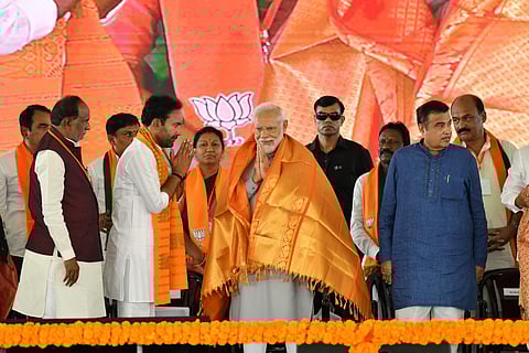 Prime Minister Narendra Modi with Union Minister G. Kishan Reddy during a public meeting in Telangana. (Photo | Special Arrangement)