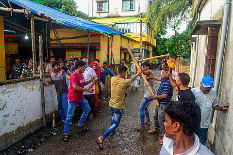 Workers of rival political groups in a clash during the panchayat elections at Barasat in North 24 Parganas district of West Bengal (Photo | PTI)