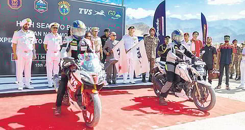 Ladakh LG Brigadier BD Mishra (Retd) and Indian Navy Chief Admiral R Hari Kumar flag off a motorcycle rally from Spituk Football Stadium in Leh on Friday | express
