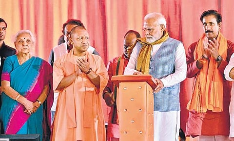 PM Narendra Modi with Uttar Pradesh CM Yogi Adityanath during the closing ceremony of centenary celebrations of Gita Press in Gorakhpur on Friday | pti