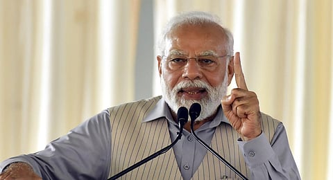 Prime Minister Narendra Modi speaks during a public meeting in Warangal. (Photo | PTI)